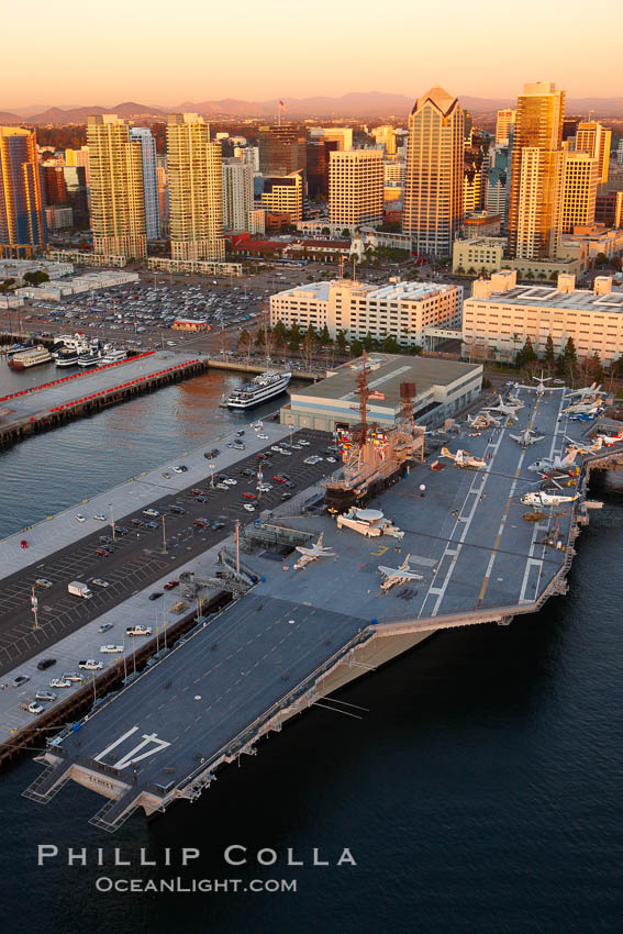 Downtown San Diego and USS Midway.  The USS Midway was a US Navy aircraft carrier, launched in 1945 and active through the Vietnam War and Operation Desert Storm, as of 2008 a museum along the downtown waterfront in San Diego. California, USA, natural history stock photograph, photo id 22430