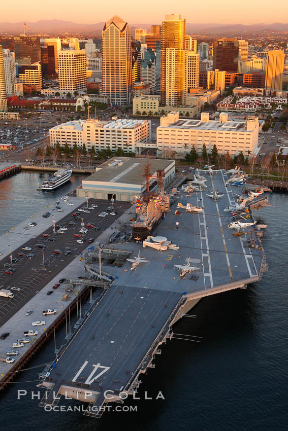 Downtown San Diego and USS Midway.  The USS Midway was a US Navy aircraft carrier, launched in 1945 and active through the Vietnam War and Operation Desert Storm, as of 2008 a museum along the downtown waterfront in San Diego. California, USA, natural history stock photograph, photo id 22355