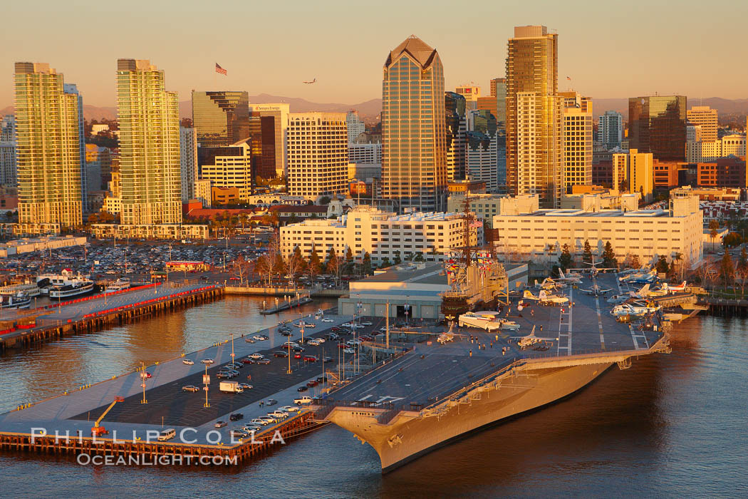 Downtown San Diego and USS Midway.  The USS Midway was a US Navy aircraft carrier, launched in 1945 and active through the Vietnam War and Operation Desert Storm, as of 2008 a museum along the downtown waterfront in San Diego. California, USA, natural history stock photograph, photo id 22389