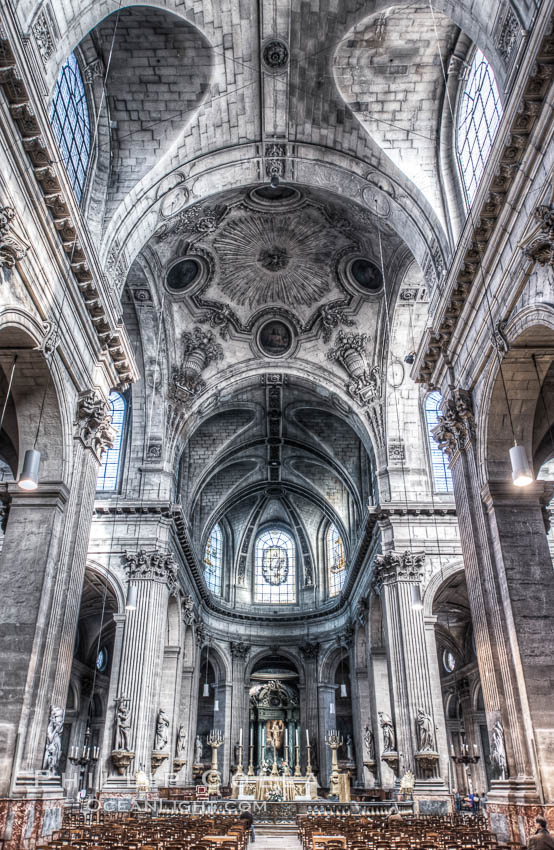 Eglise Saint-Sulpice. Saint-Sulpice is a Roman Catholic church in Paris, France, on the east side of the Place Saint-Sulpice, in the Luxembourg Quarter of the VIe arrondissement. At 113 metres long, 58 metres in width and 34 metres tall, it is only slightly smaller than Notre-Dame and thus the second largest church in the city., natural history stock photograph, photo id 28126