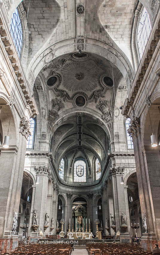 Eglise Saint-Sulpice. Saint-Sulpice is a Roman Catholic church in Paris, France, on the east side of the Place Saint-Sulpice, in the Luxembourg Quarter of the VIe arrondissement. At 113 metres long, 58 metres in width and 34 metres tall, it is only slightly smaller than Notre-Dame and thus the second largest church in the city., natural history stock photograph, photo id 28264