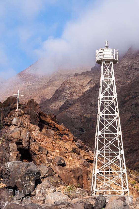 Lighthouse and cross mark the site of a small fishing shack and old chapel and prison near the north end of Guadalupe Island (Isla Guadalupe). Baja California, Mexico, natural history stock photograph, photo id 09730