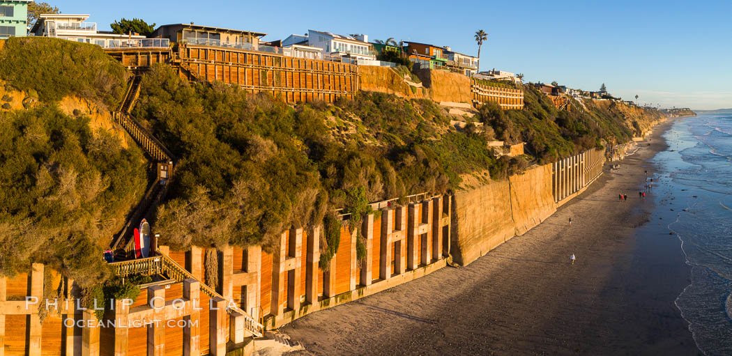 Falling bluffs and reinforcements, buttressing, Encinitas and Leucadia. These bluffs are coming down, its only a matter of time, but residents spend to prop up the bluffs and keep their homes from falling into the ocean., natural history stock photograph, photo id 38140