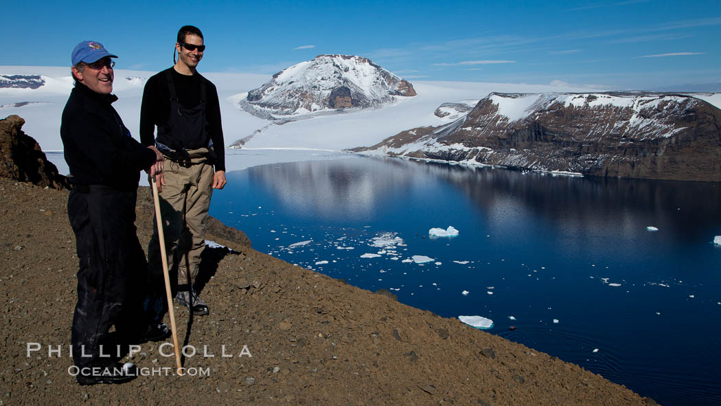 Enjoying a sunny warm day on the summit of Devil Island, with the cliffs of Vega Island in the distance. Antarctic Peninsula, Antarctica, natural history stock photograph, photo id 24998