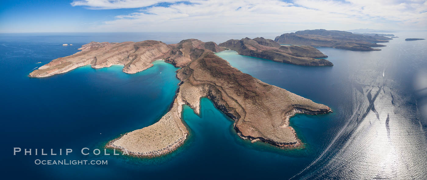 Ensenada Grande, Isla Partida, Sea of Cortez. From left to right: Punta Tintorera, Ensenada Grande, Punta Tijeretas, Las Cuevitas, El Cardonal. Los Islotes visible in distance at upper left. Baja California, Mexico, natural history stock photograph, photo id 32410