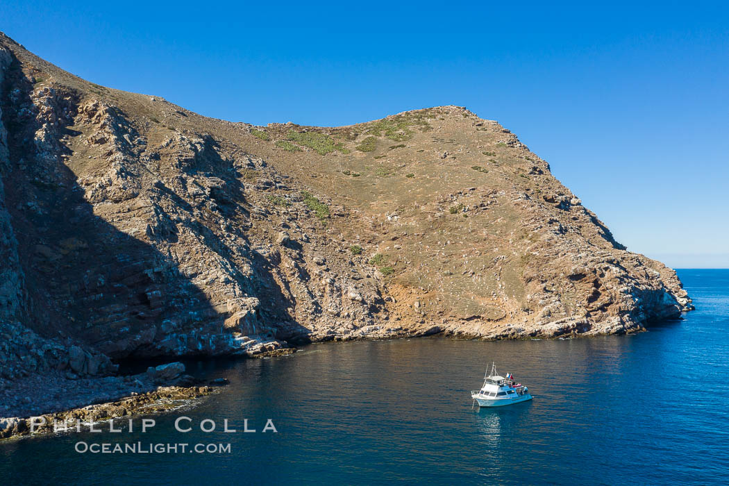 Boat at anchor at Lobster Shack Cove, Aerial Photo of North Coronado Island, Baja California, Mexico. Coronado Islands (Islas Coronado), natural history stock photograph, photo id 34571