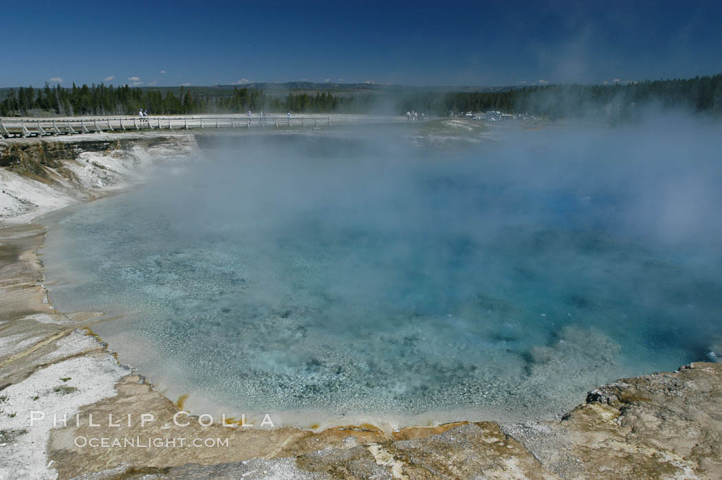 Excelsior Geyser, now dormant, was formerly the worlds largest geyser.  It still produces immense runoff into the Firehole River: 4,500 gallons per minute, or 6 million gallons per day.  It is located in Midway Geyser Basin. Yellowstone National Park, Wyoming, USA, natural history stock photograph, photo id 07261