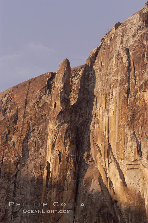 The Finger, a dramatic spire alongside Yosemite Falls that is a popular destination for advanced climbers.  Note the rope suspended between the spire and cliffs.  Yosemite Valley. Yosemite National Park, California, USA, natural history stock photograph, photo id 07655