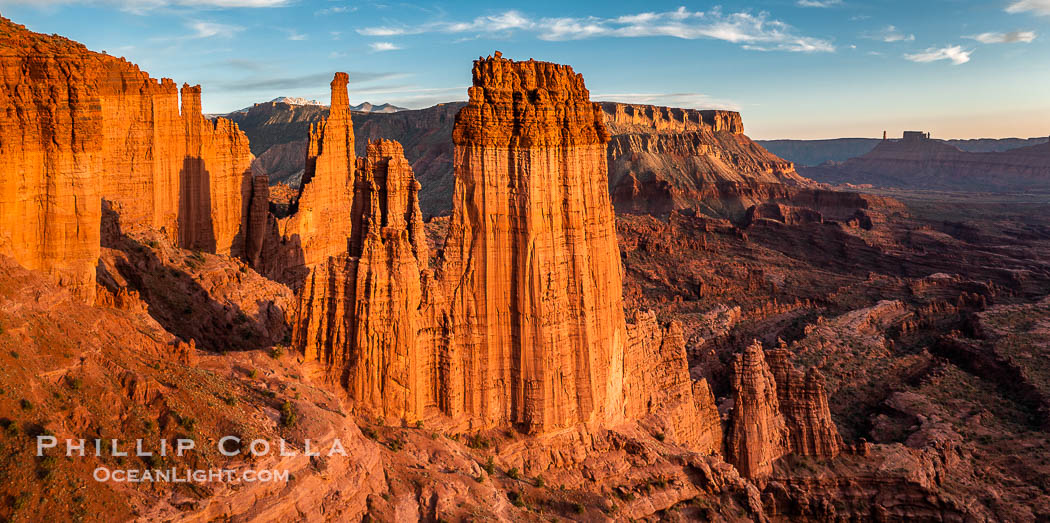 Fisher Towers at sunset, near Moab, Utah. Fisher Towers are a series of towers made of Cutler sandstone capped with Moenkopi sandstone and caked with a stucco of red mud located near Moab, Utah. USA, natural history stock photograph, photo id 38225