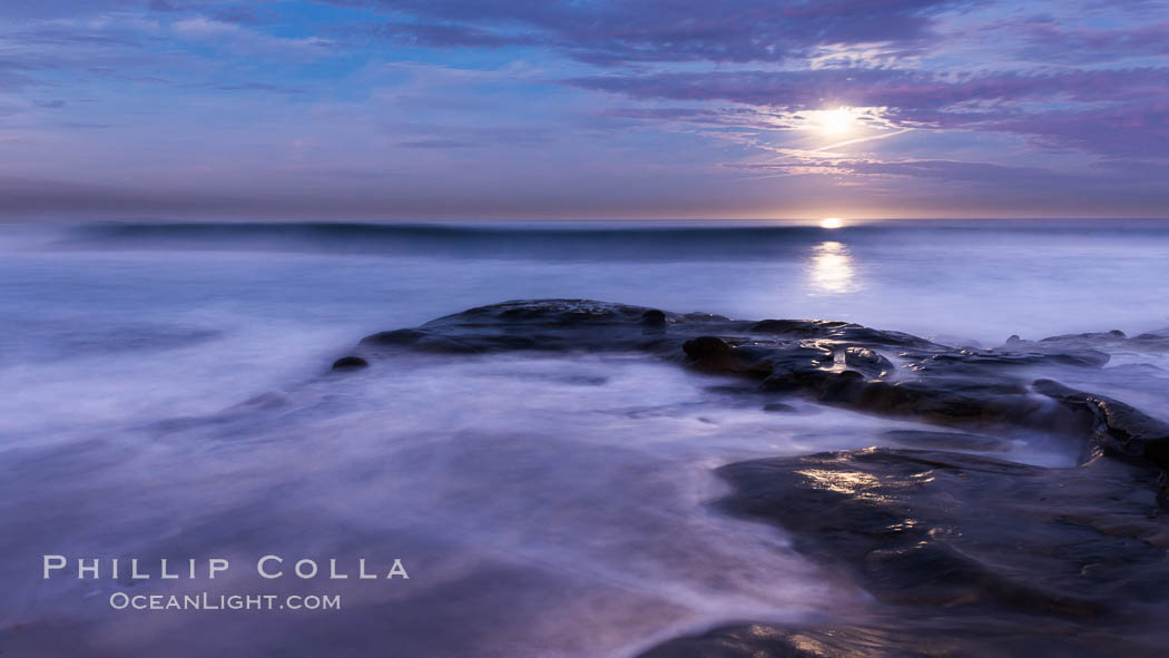Breaking waves crash upon a rocky reef under the light of a full moon. La Jolla, California, USA, natural history stock photograph, photo id 28869