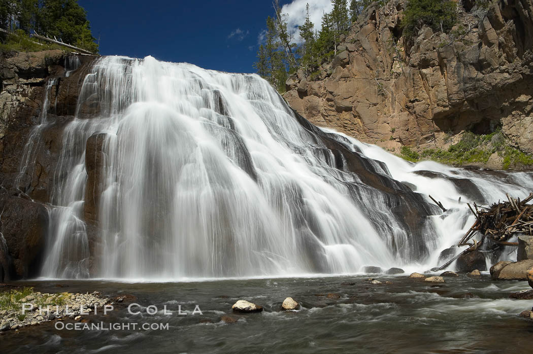 Gibbon Falls drops 80 feet through a deep canyon formed by the Gibbon River. Although visible from the road above, the best vantage point for viewing the falls is by hiking up the river itself. Yellowstone National Park, Wyoming, USA, natural history stock photograph, photo id 13279