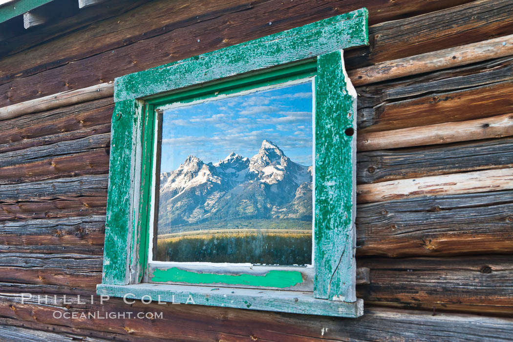 Teton Range reflection, in window of old barn in Grand Teton National Park. Wyoming, USA, natural history stock photograph, photo id 26928