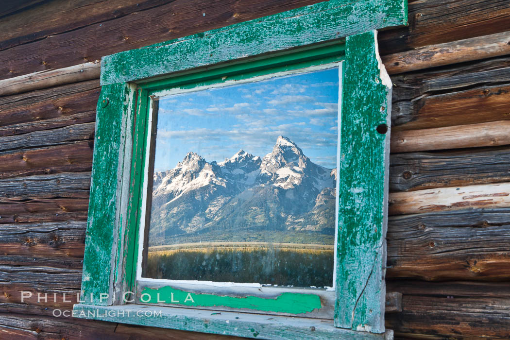 Teton Range reflection, in window of old barn in Grand Teton National Park. Wyoming, USA, natural history stock photograph, photo id 26915