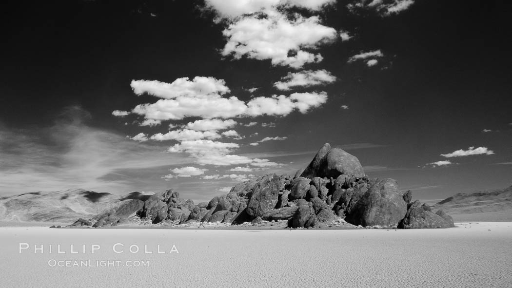 The Grandstand, standing above dried mud flats, on the Racetrack Playa in Death Valley. Death Valley National Park, California, USA, natural history stock photograph, photo id 25318