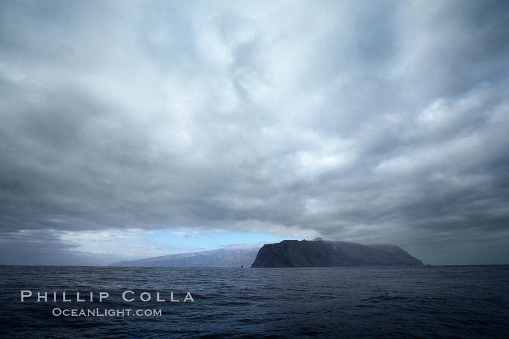 Guadalupe Island, dark and gloomy clouds, northern approach. Guadalupe Island (Isla Guadalupe), Baja California, Mexico, natural history stock photograph, photo id 21369