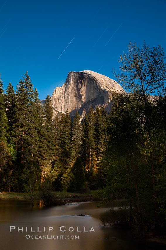 Half Dome and star trails, at night, viewed from Sentinel Bridge, illuminated by the light of the full moon. Yosemite National Park, California, USA, natural history stock photograph, photo id 27755