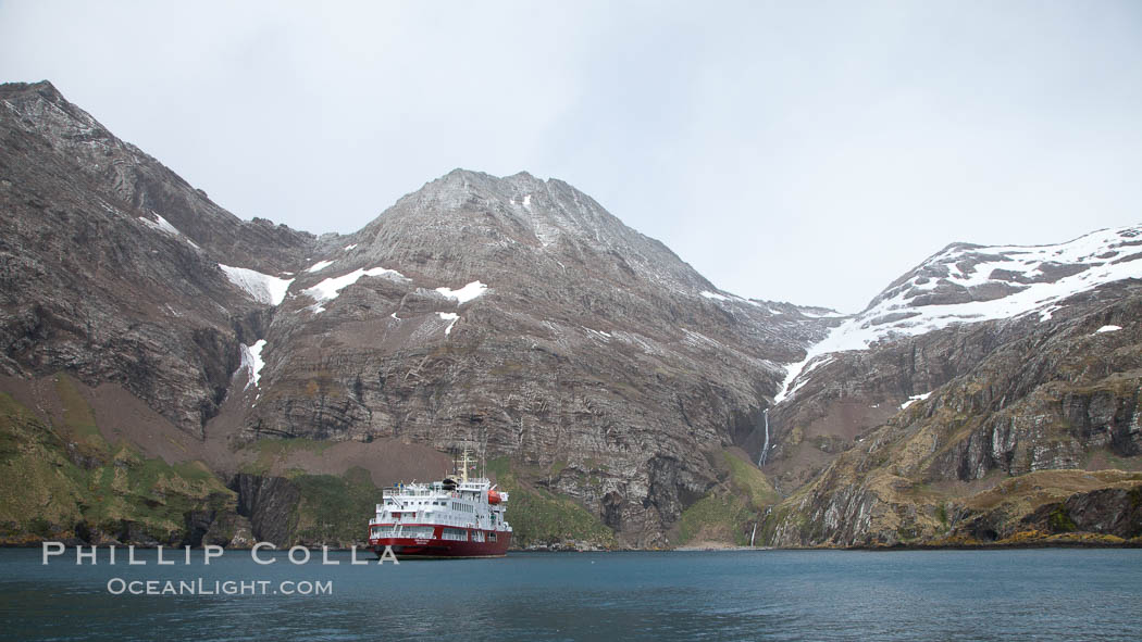 Hercules Bay, with icebreaker M/V Polar Star at anchor, below the steep mountains of South Georgia Island., natural history stock photograph, photo id 24564