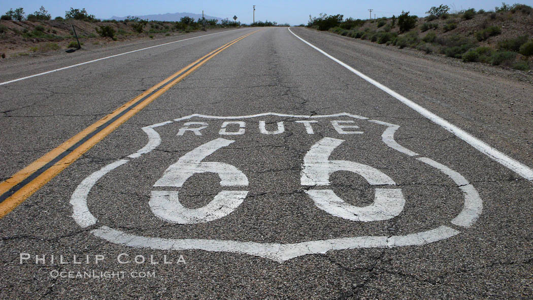 Route 66 (also known as U.S. Route 66, The Main Street of America, The Mother Road and the Will Rogers Highway) was a highway in the U.S. Highway system. One of the original federal routes, US 66 was established in 1926 and originally ran from Chicago through Missouri, Kansas, Oklahoma, Texas, New Mexico, Arizona, and California, before ending at Los Angeles for a total of 2,448 miles.  US 66 was officially decommissioned (i.e., removed from the offical U.S. Highway system) in 1985 after it was decided the route was no longer relevant and had been replaced by the Interstate Highway System. USA, natural history stock photograph, photo id 20567