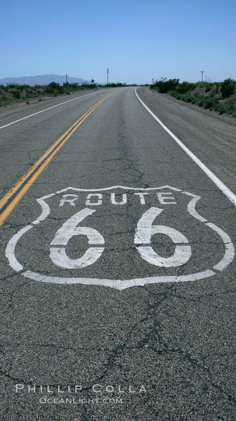 Route 66 (also known as U.S. Route 66, The Main Street of America, The Mother Road and the Will Rogers Highway) was a highway in the U.S. Highway system. One of the original federal routes, US 66 was established in 1926 and originally ran from Chicago through Missouri, Kansas, Oklahoma, Texas, New Mexico, Arizona, and California, before ending at Los Angeles for a total of 2,448 miles.  US 66 was officially decommissioned (i.e., removed from the offical U.S. Highway system) in 1985 after it was decided the route was no longer relevant and had been replaced by the Interstate Highway System. USA, natural history stock photograph, photo id 20593