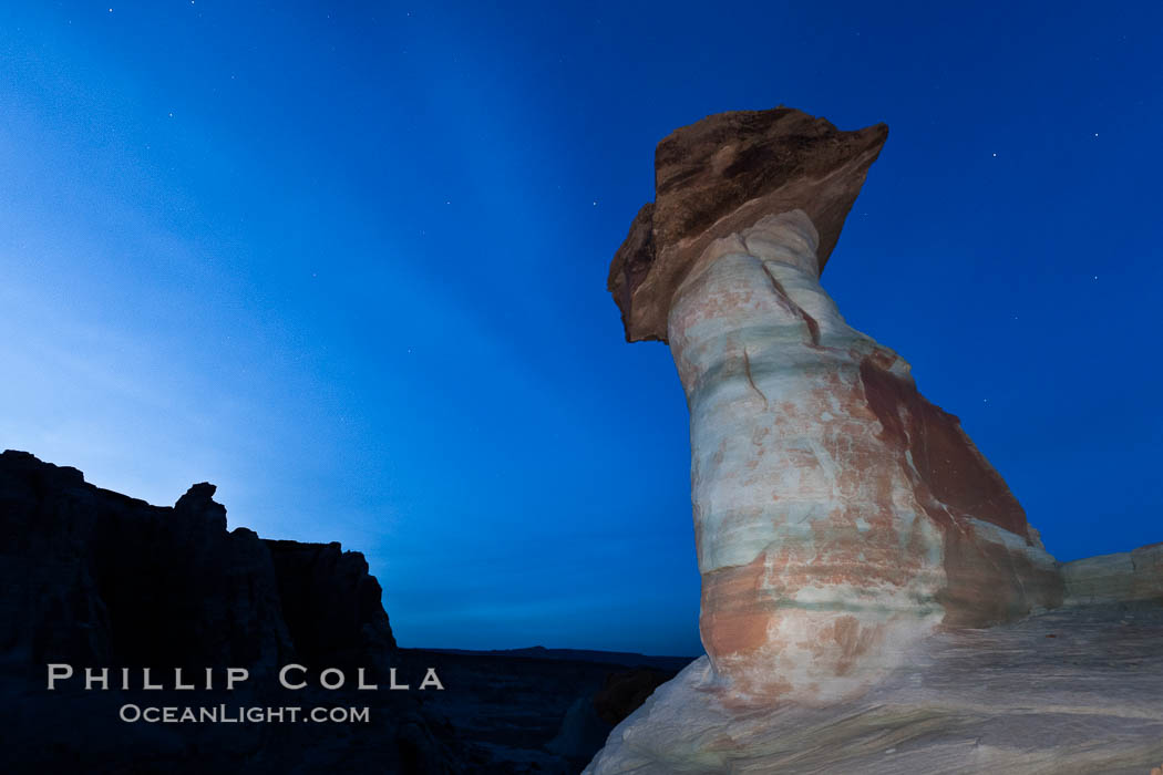 Pedestal rock, or hoodoo, at Stud Horse Point.  These hoodoos form when erosion occurs around but not underneath a more resistant caprock that sits atop of the hoodoo spire. Page, Arizona, USA, natural history stock photograph, photo id 26623