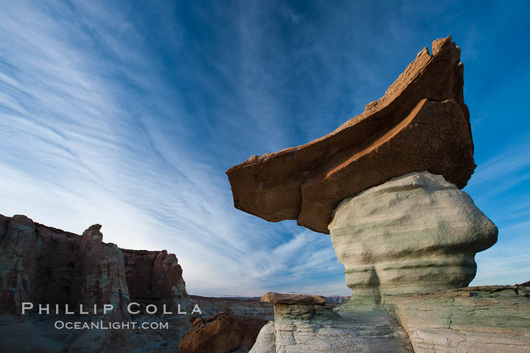 Pedestal rock, or hoodoo, at Stud Horse Point.  These hoodoos form when erosion occurs around but not underneath a more resistant caprock that sits atop of the hoodoo spire. Page, Arizona, USA, natural history stock photograph, photo id 26609