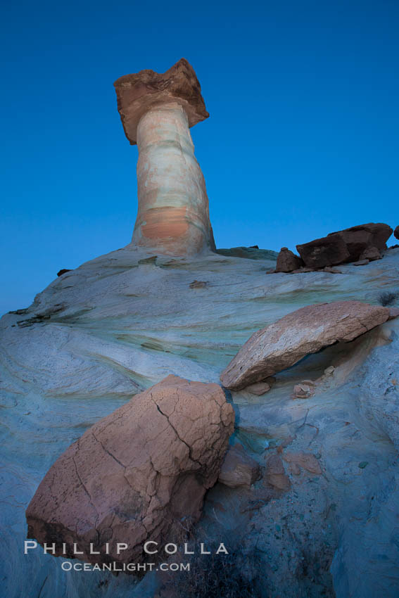 Pedestal rock, or hoodoo, at Stud Horse Point.  These hoodoos form when erosion occurs around but not underneath a more resistant caprock that sits atop of the hoodoo spire. Page, Arizona, USA, natural history stock photograph, photo id 26641