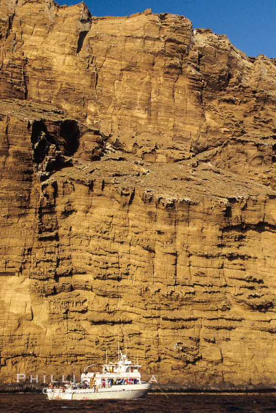 Boat Horizon below eastern cliffs of Isla Afuera, sunrise. Guadalupe Island (Isla Guadalupe), Baja California, Mexico, natural history stock photograph, photo id 03700