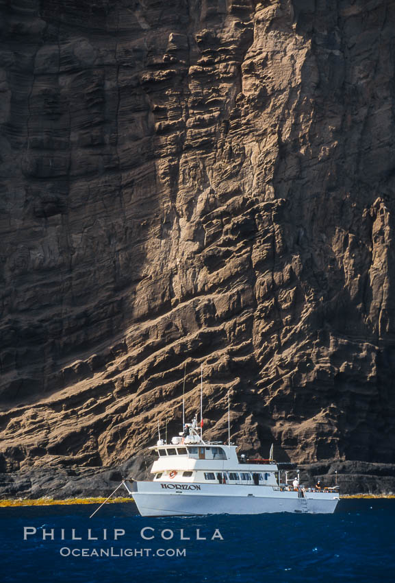 Boat Horizon below eastern cliffs of Isla Afuera, sunrise. Guadalupe Island (Isla Guadalupe), Baja California, Mexico, natural history stock photograph, photo id 03713