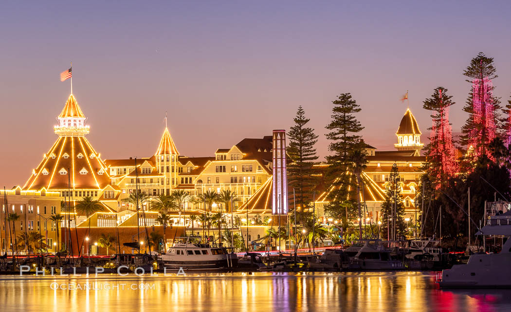 Hotel del Coronado with holiday Christmas night lights, known affectionately as the Hotel Del. It was once the largest hotel in the world, and is one of the few remaining wooden Victorian beach resorts.  The Hotel Del is widely considered to be one of Americas most beautiful and classic hotels. Built in 1888, it was designated a National Historic Landmark in 1977. California, USA, natural history stock photograph, photo id 37492