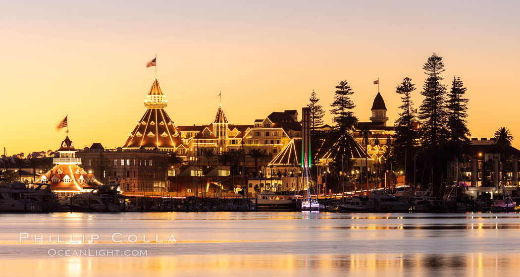 Hotel del Coronado with holiday Christmas night lights, known affectionately as the Hotel Del. It was once the largest hotel in the world, and is one of the few remaining wooden Victorian beach resorts.  The Hotel Del is widely considered to be one of Americas most beautiful and classic hotels. Built in 1888, it was designated a National Historic Landmark in 1977., natural history stock photograph, photo id 36617