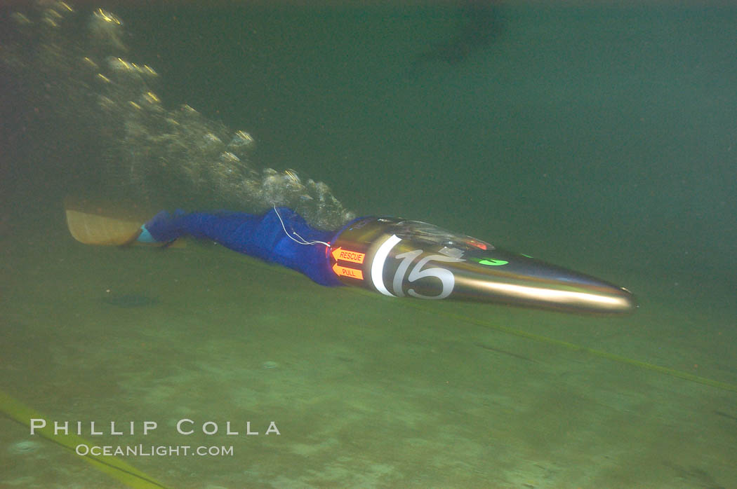 A human-powered submarine, composed off a streamlined casing which encloses half the operator as well as his air supply.  The operator kicks a single large monofin to propel the sleek submersible.  It was designed, built and operated by Virginia Tech engineering students. Offshore Model Basin, Escondido, California, USA, natural history stock photograph, photo id 09780