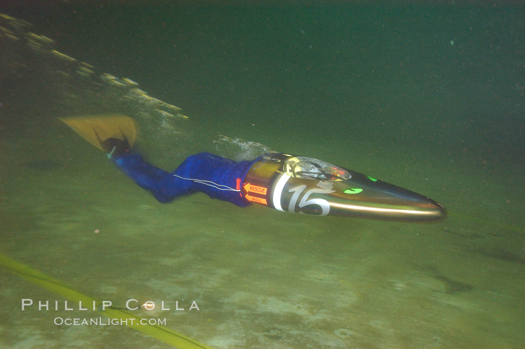 A human-powered submarine, composed off a streamlined casing which encloses half the operator as well as his air supply.  The operator kicks a single large monofin to propel the sleek submersible.  It was designed, built and operated by Virginia Tech engineering students. Offshore Model Basin, Escondido, California, USA, natural history stock photograph, photo id 09781