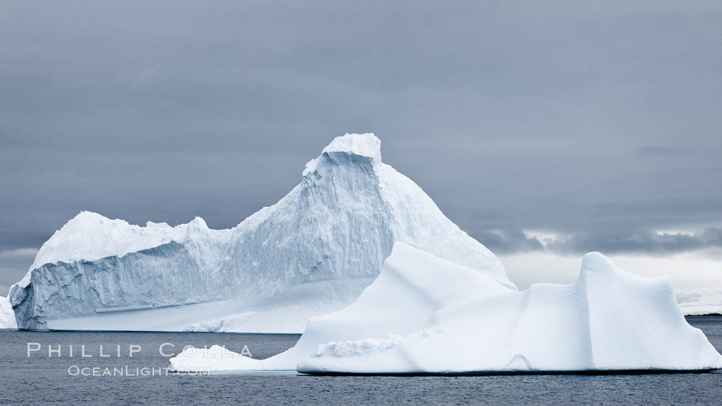 Icebergs in Paradise Bay, sculpted by water and time, Antarctica., natural history stock photograph, photo id 25658