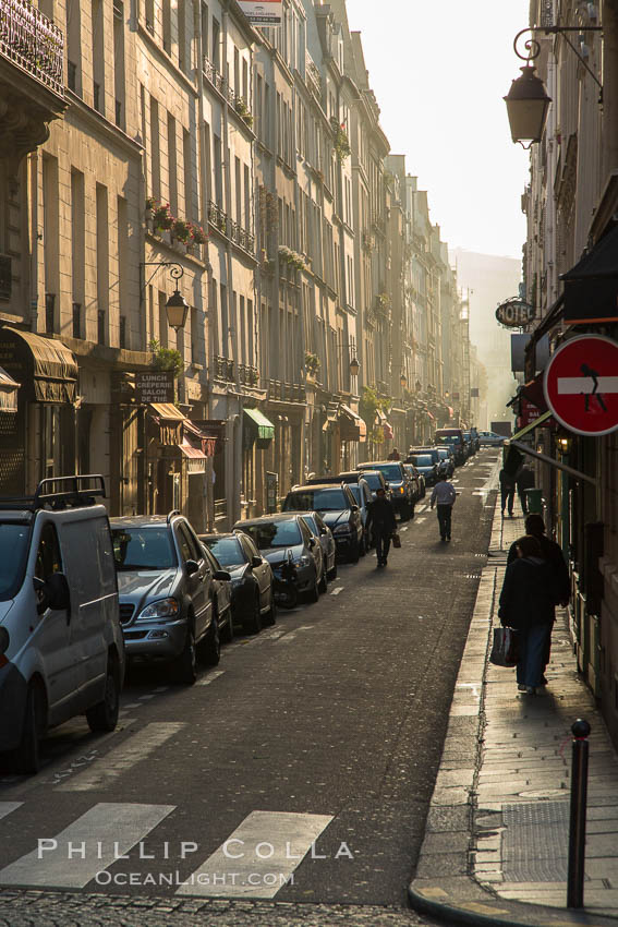 Rue de Ile Saint-Louis, early morning, Paris. Ile Saint-Louis is one of two natural islands in the Seine river, in Paris, France. The island is named after King Louis IX of France (Saint Louis). The island is connected to the rest of Paris by bridges to both banks of the river and by the Pont Saint Louis to the Ile de la Cite., natural history stock photograph, photo id 28216
