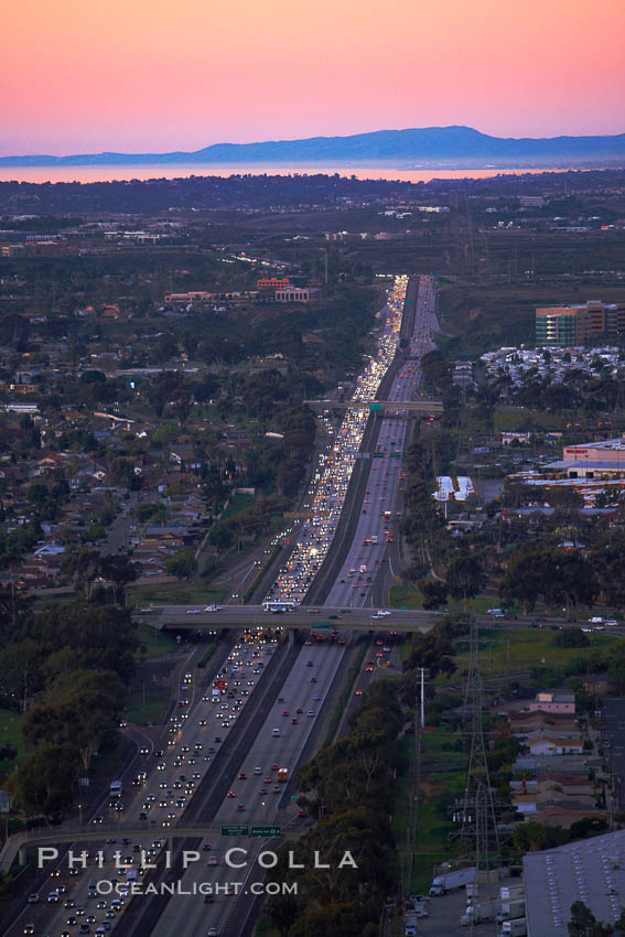 Interstate 805, rushhour traffic at sunset, looking north with the hills of Camp Pendleton and Oceanside in the distance. San Diego, California, USA, natural history stock photograph, photo id 22317