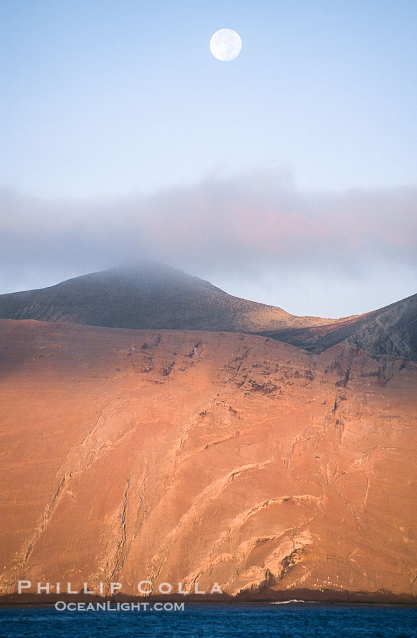 Arches on Isla Adentro and setting moon, daybreak., natural history stock photograph, photo id 06147