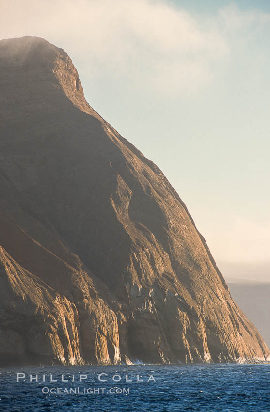 East face of Isla Adentro at Guadalupe Island, daybreak. Guadalupe Island (Isla Guadalupe), Baja California, Mexico, natural history stock photograph, photo id 06151