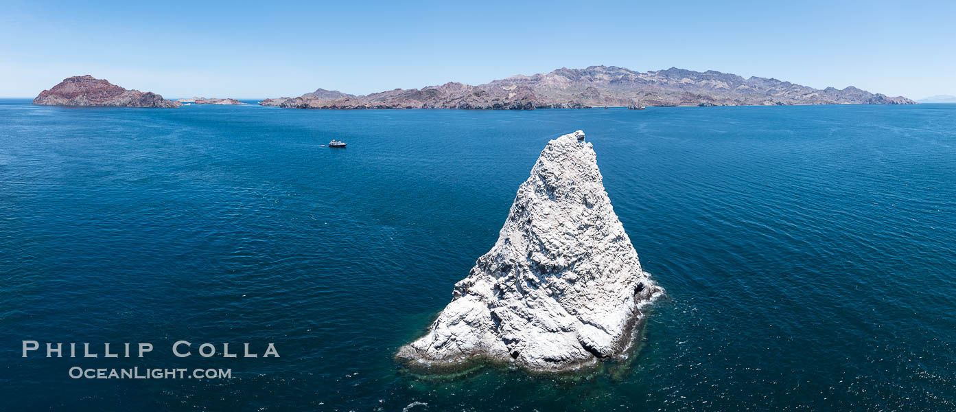 Isla Angel de la Guarda, Aerial Photo, Sea of Cortez, Mexico. This offshore pinnacle near Isla de la Guarda island offers spectacular underwater scenery ak=long with a slew of nudibranchs. Guardian Angel island is part of the Midriff Islands in Mexico's Sea of Cortez Isla Angel de la Guarda, Aerial Photo, Sea of Cortez, Mexico. This offshore pinnacle near Isla de la Guarda island offers spectacular underwater scenery along with a slew of nudibranchs. Guardian Angel island is part of the Midriff Islands in Mexico's Sea of Cortez