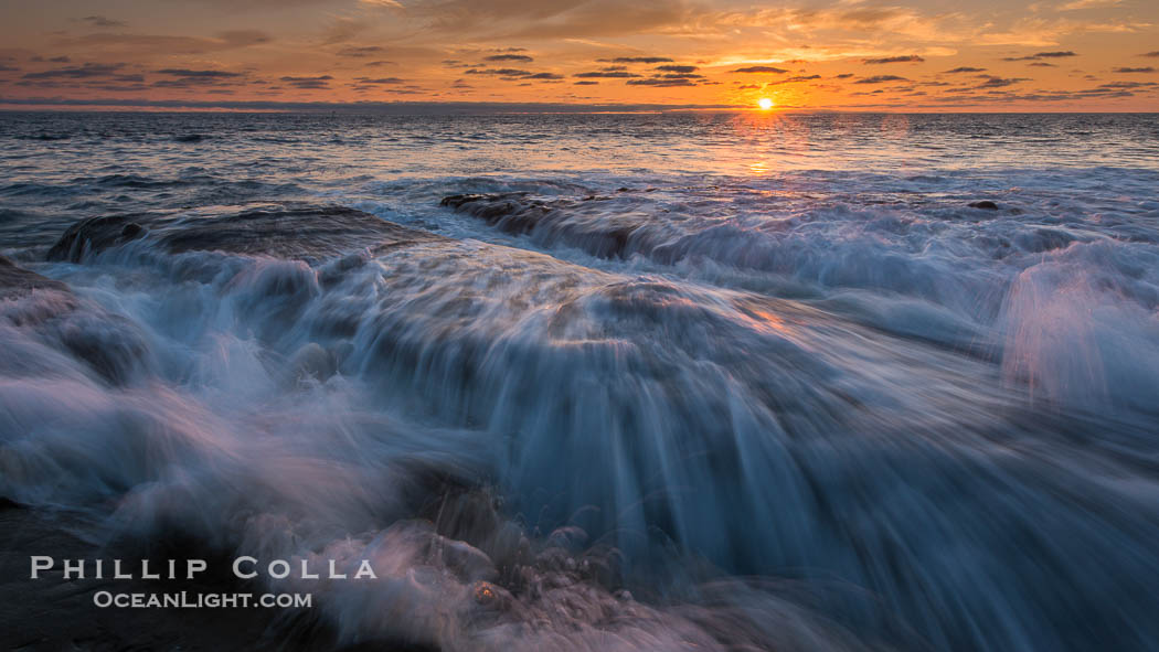 La Jolla coast sunset, waves wash over sandstone reef, clouds and sky., natural history stock photograph, photo id 27892