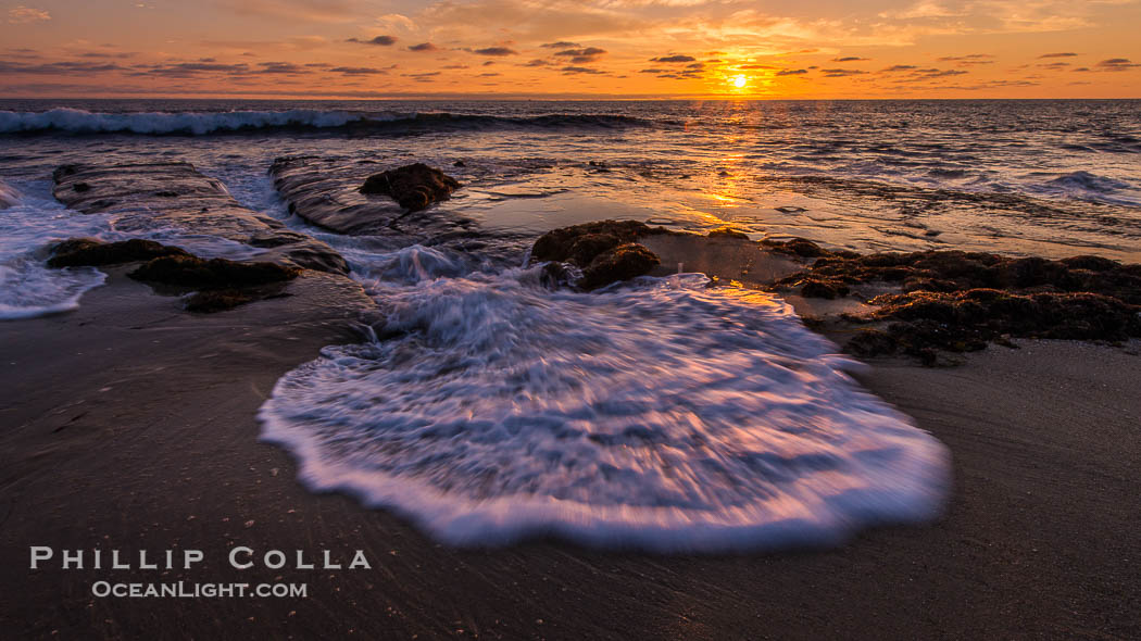La Jolla coast sunset, waves wash over sandstone reef, clouds and sky., natural history stock photograph, photo id 27891