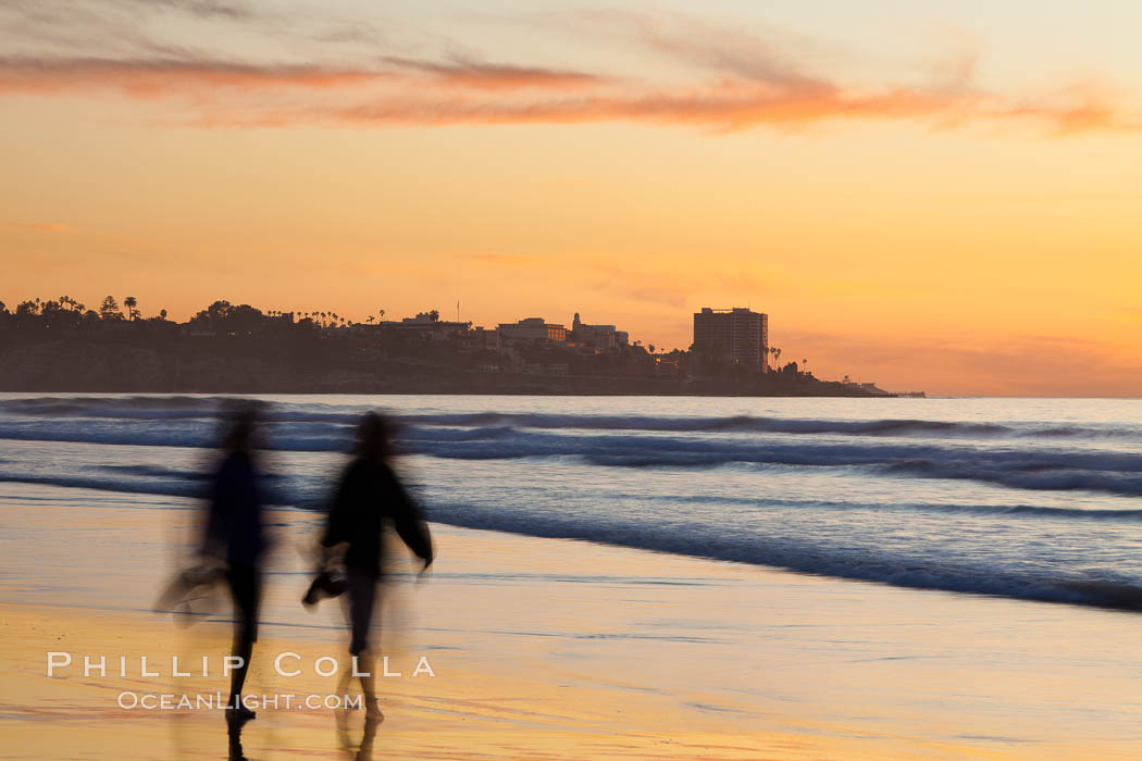 Tourists walk along La Jolla Shores beach at sunset.  Point La Jolla is visible in the distance. Scripps Institution of Oceanography, California, USA, natural history stock photograph, photo id 26533