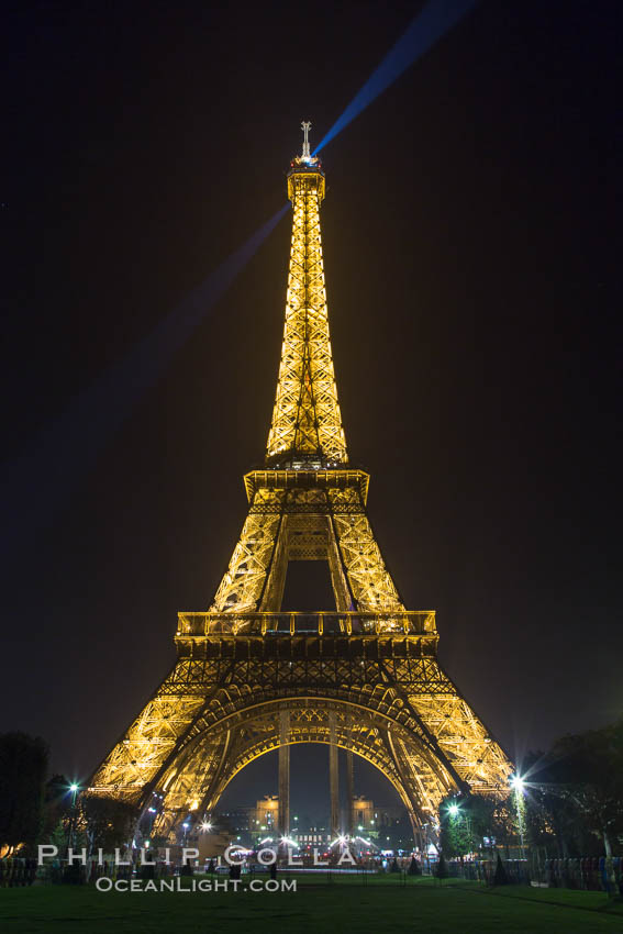 La Tour Eiffel. The Eiffel Tower is an iron lattice tower located on the Champ de Mars in Paris, named after the engineer Gustave Eiffel, who designed the tower in 1889 as the entrance arch to the 1889 World's Fair. The Eiffel tower is the tallest structure in Paris and the most-visited paid monument in the world. France, natural history stock photograph, photo id 28206