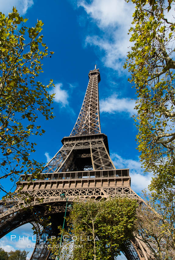 La Tour Eiffel. The Eiffel Tower is an iron lattice tower located on the Champ de Mars in Paris, named after the engineer Gustave Eiffel, who designed the tower in 1889 as the entrance arch to the 1889 World's Fair. The Eiffel tower is the tallest structure in Paris and the most-visited paid monument in the world. France, natural history stock photograph, photo id 28117