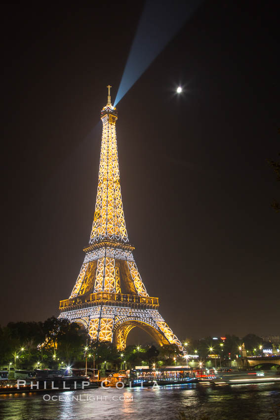 La Tour Eiffel. The Eiffel Tower is an iron lattice tower located on the Champ de Mars in Paris, named after the engineer Gustave Eiffel, who designed the tower in 1889 as the entrance arch to the 1889 World's Fair. The Eiffel tower is the tallest structure in Paris and the most-visited paid monument in the world. France, natural history stock photograph, photo id 28205