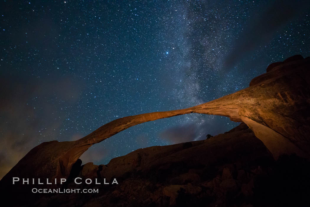 Landscape Arch and Milky Way, stars rise over the arch at night. (Note: this image was created before a ban on light-painting in Arches National Park was put into effect.  Light-painting is no longer permitted in Arches National Park). Utah, USA, natural history stock photograph, photo id 27870