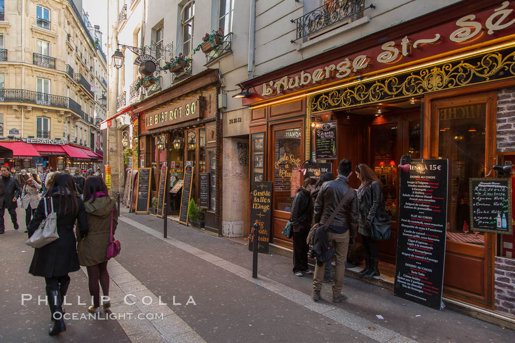 Latin Quarter.  The Latin Quarter of Paris is an area in the 5th and parts of the 6th arrondissement of Paris. It is situated on the left bank of the Seine, around the Sorbonne known for student life, lively atmosphere and bistros. Quartier Latin, France, natural history stock photograph, photo id 28184