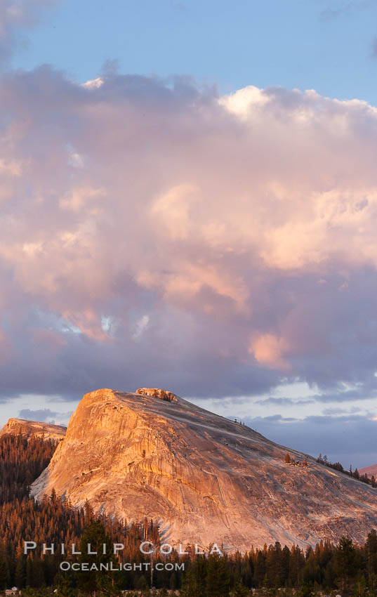 Lembert Dome and late afternoon clouds rise above Tuolumne Meadows in the High Sierra, catching the fading light of sunset. Yosemite National Park, California, USA, natural history stock photograph, photo id 09943