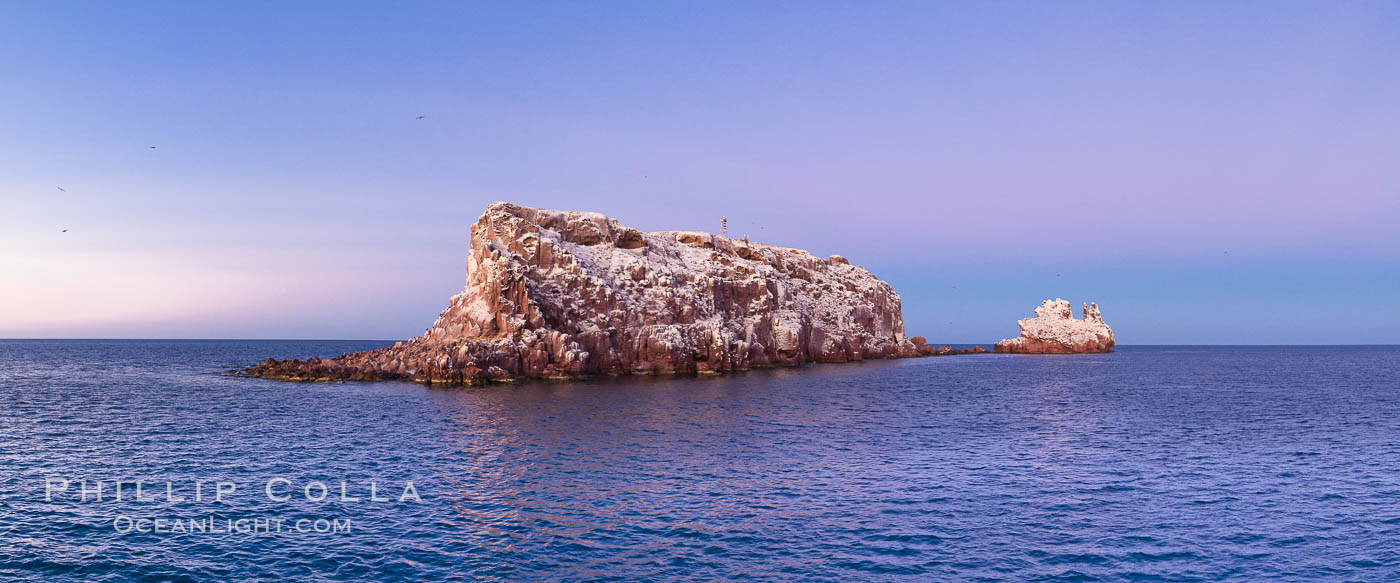 Earth shadow over Los Islotes Island, famous for its friendly colony of California sea lions, Espiritu Santo Biosphere Reserve, Sea of Cortez, Baja California, Mexico., natural history stock photograph, photo id 27364