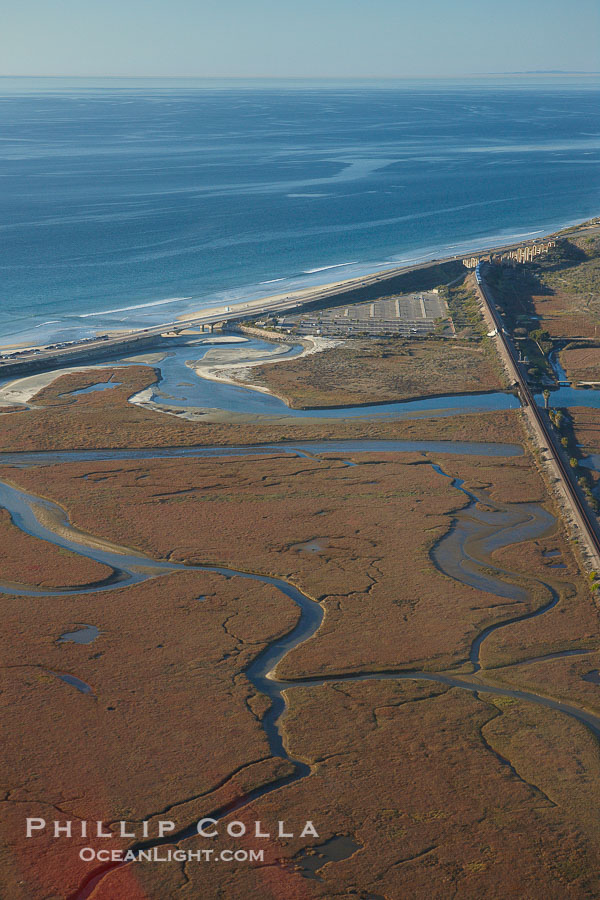 Los Penasquitos Marsh, seen from above along the coast south of Del Mar, where it exchanges fresh and salt water iwith the Pacific Ocean along Torrey Pines State Beach., natural history stock photograph, photo id 22309