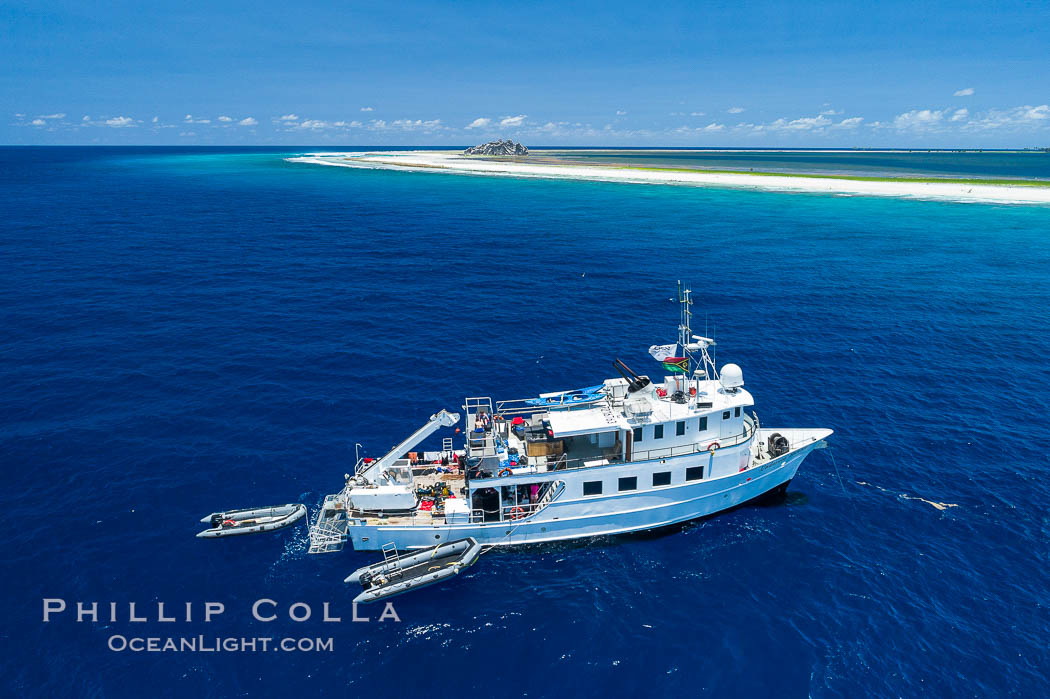 Aerial photo of M/V Nautilus Undersea at Clipperton Island.  Clipperton Island, a minor territory of France also known as Ile de la Passion, is a small (2.3 sq mi) but  spectacular coral atoll in the eastern Pacific. By permit HC / 1485 / CAB (France)., natural history stock photograph, photo id 32898